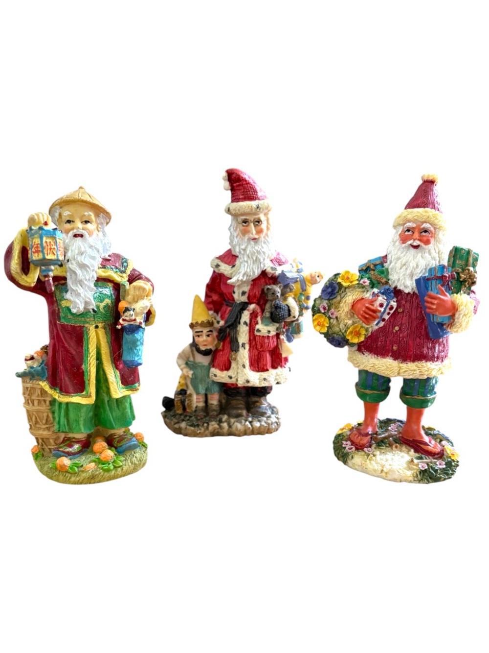VINTAGEโSET OF 3: International Santa Claus Figurines
